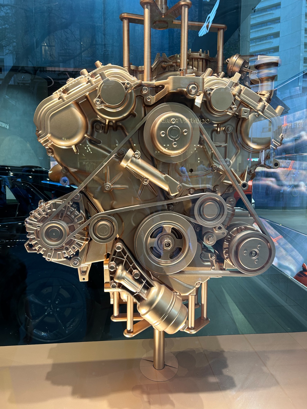 A V6, cast in gold